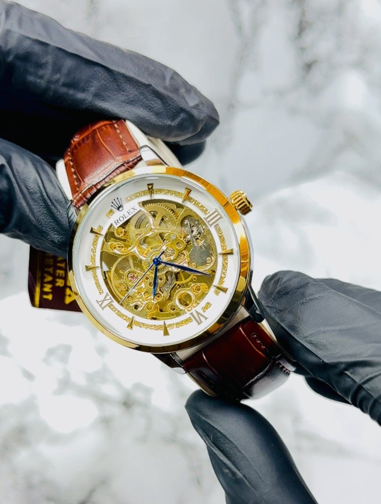 Skeleton Dial Rolex-Inspired Watch With Blue Hands And Roman Numerals